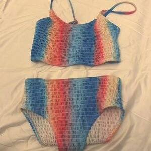 It is sized as a 9 year old but it fits my 13yr